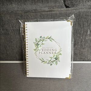 White and Gold Wedding Planner